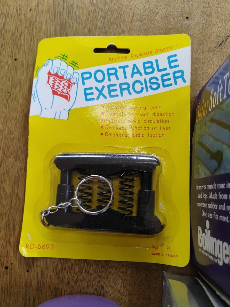 Lot Of Exercise Weights And Hand Exerciser