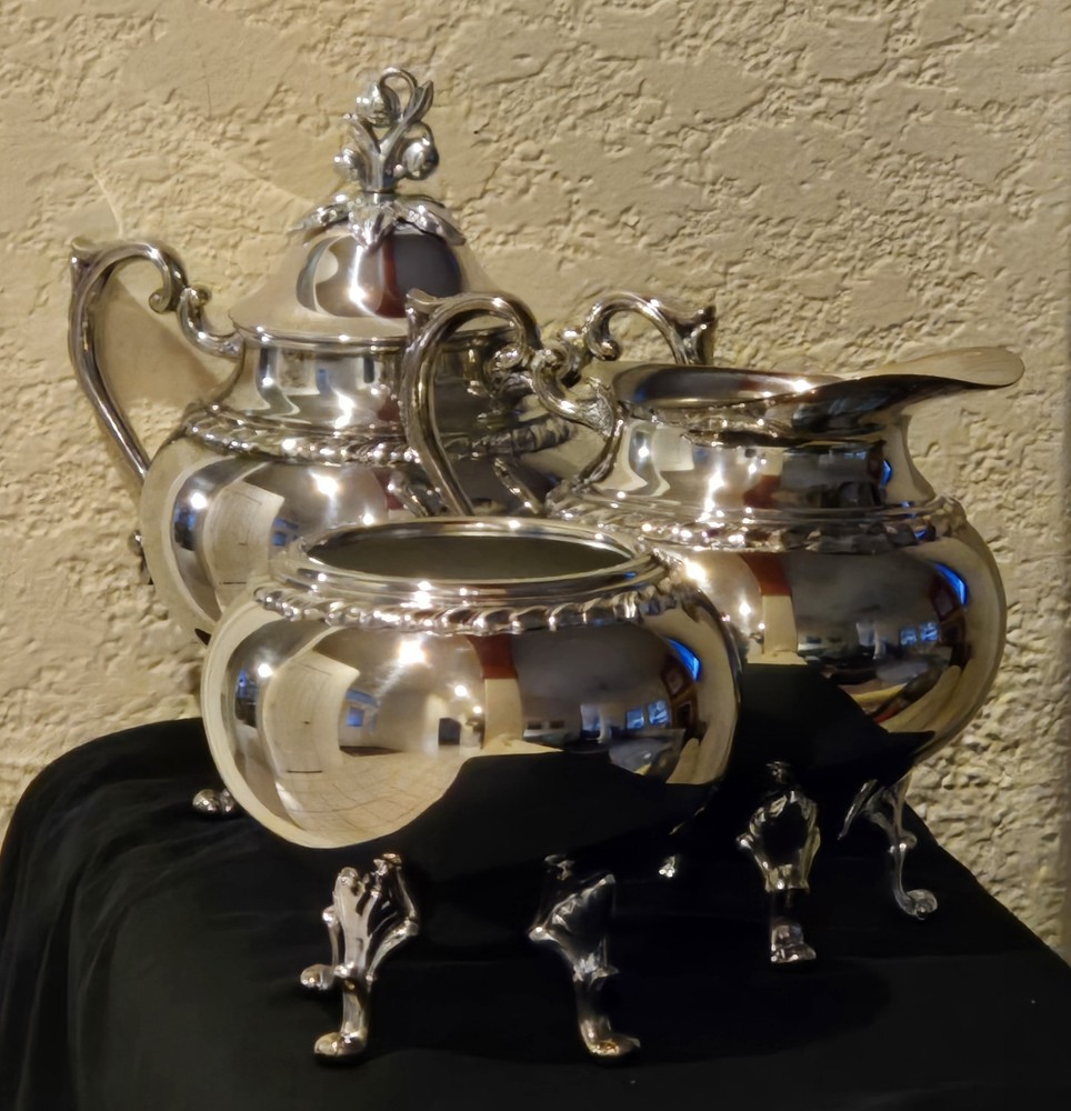 1980's silver over copper, creamer, two sugar bowls