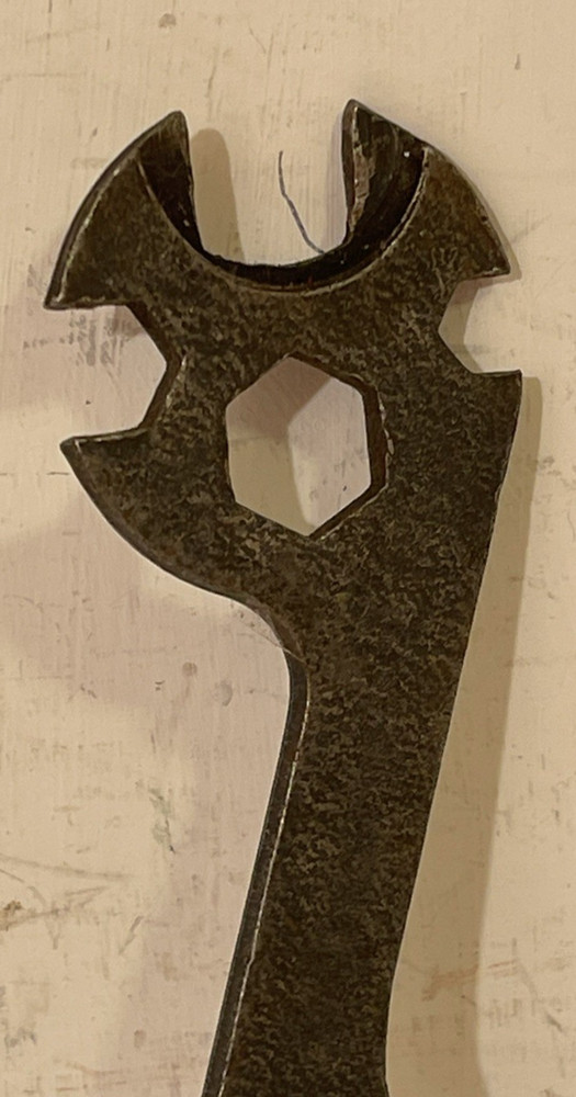A vintage British mullti-use bicycle spanner