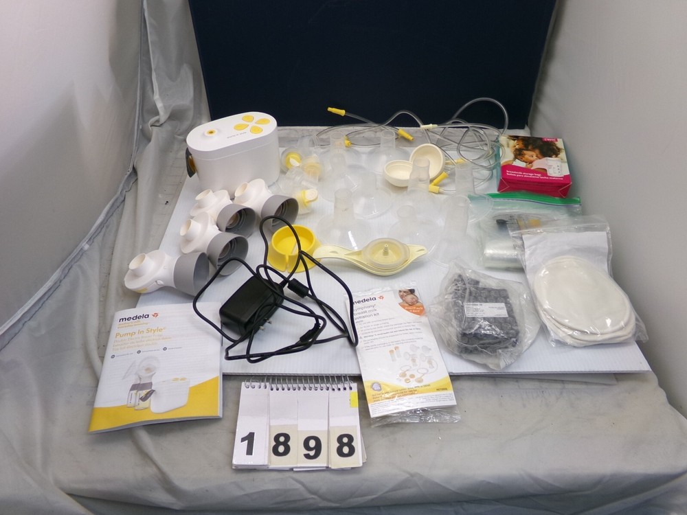 Medela  Breast Pump W/ ACCESSORIES & CARRY CASE