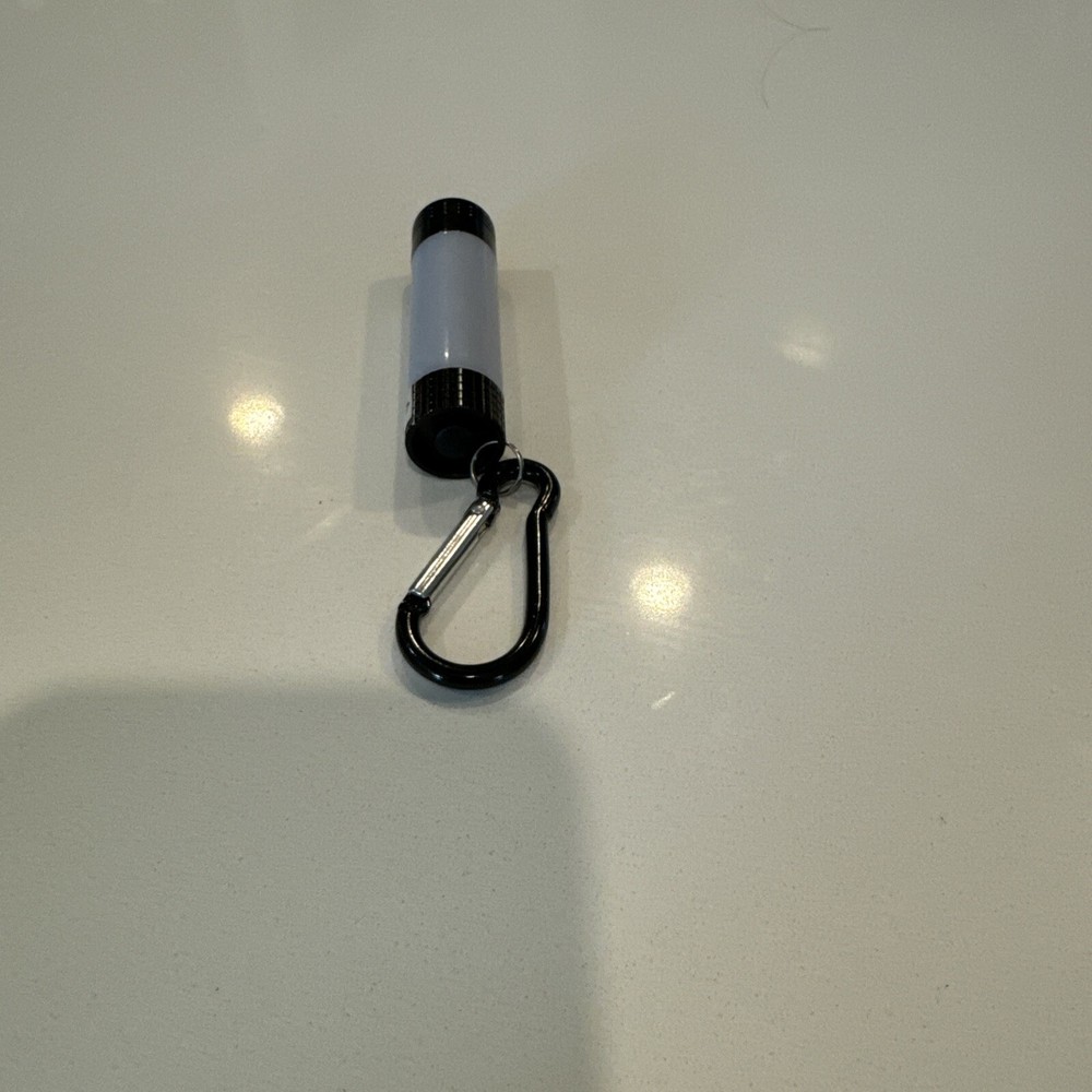 NYCC 2024 Britbox “The Passenger” Comic Con Exclusive Flashlight Keychain