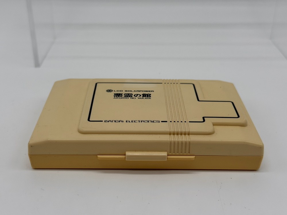 Bandai LCD Solar Power Akuryo no Yakata Double Panel Handheld system console