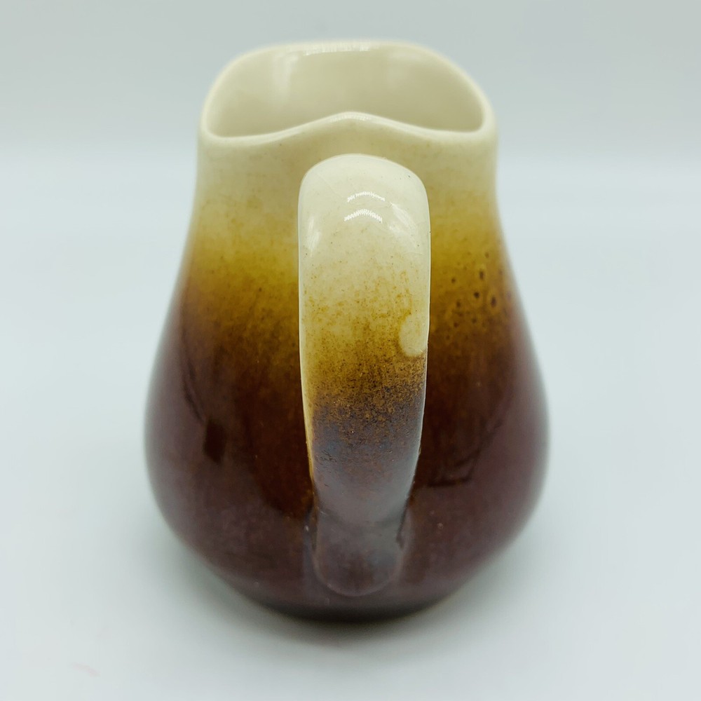 Small brown and white creamer 4.5”
