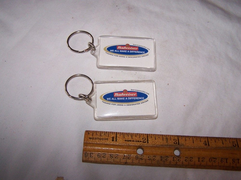 2 BUDWEISER Keychains WE ALL MAKE A DIFFERENCE Designated Drivers