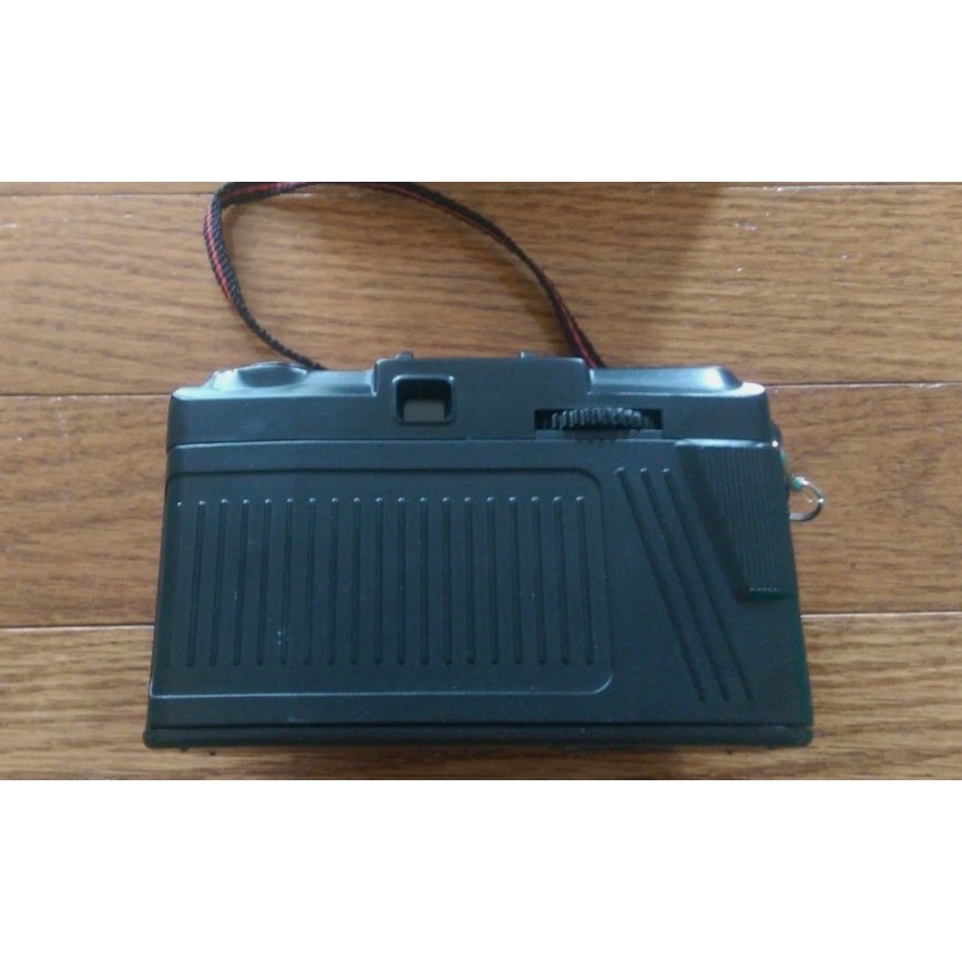 Camera Bundle - Kodak Disk 4100 Camera, Rokinon 35mm, Polaroid Flashgun #268