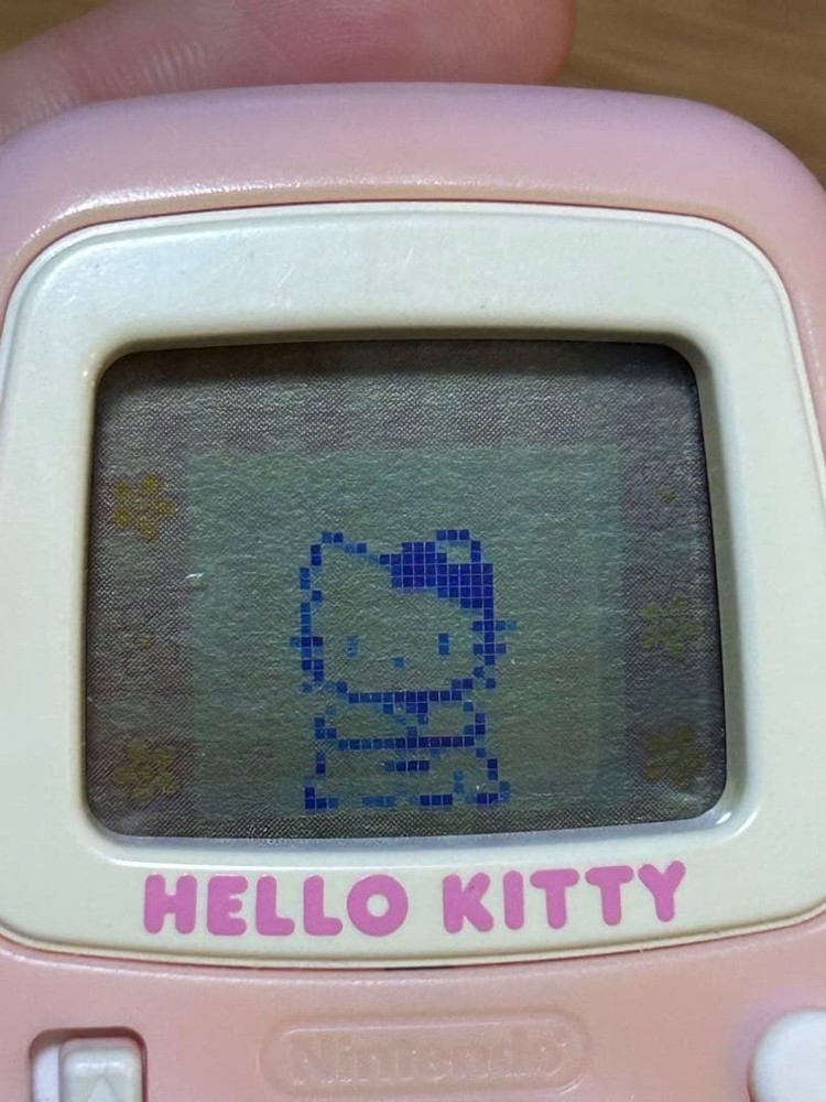 Used Hello Kitty Nintendo Pedometer Handheld Game Console Sanrio