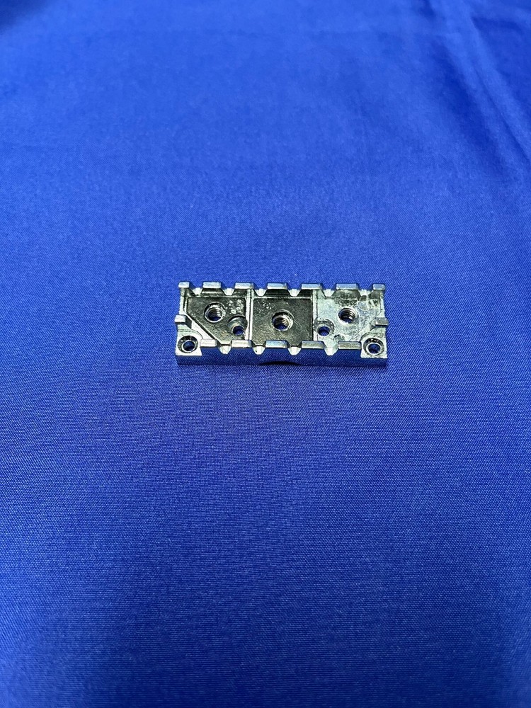 Locking Nut Wide Silver Base for an Electric Guitar