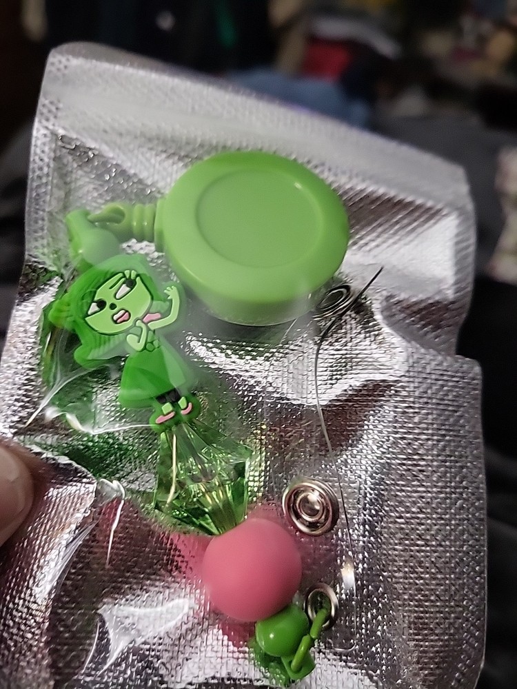 Inside Out Character Green Badge Reel
