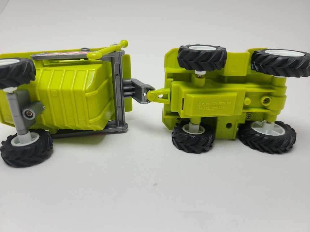 New Ray Green Dumping Tractor