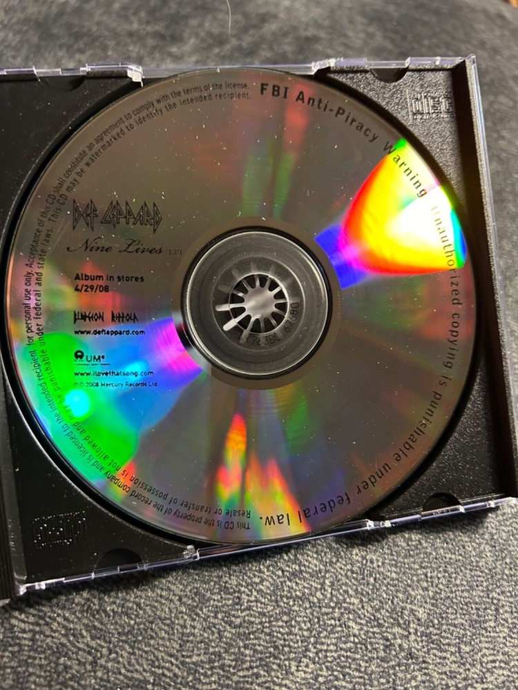 Def Leppard Autographed Nine Lives Cd Single By Two