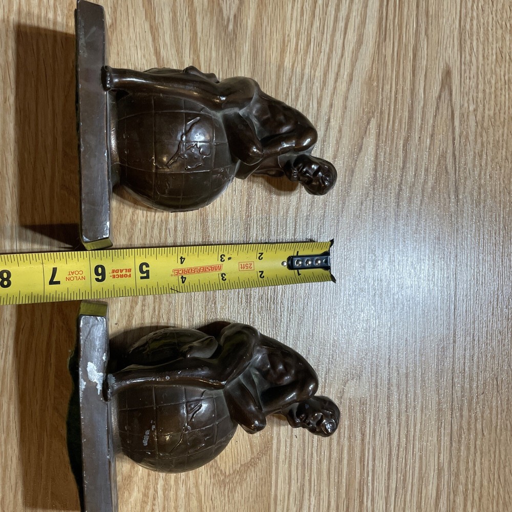vintage book ends man on earth