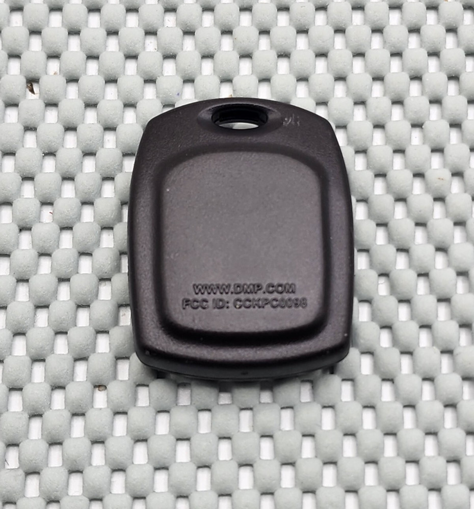 DMP CCKPC0098 1 Button Transmitter Remote Fob (NEEDS NEW BATTERY)