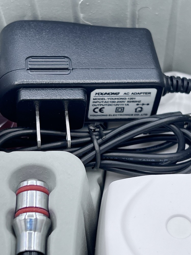 Dental 5W induction wireless curing light has dental caries detection function