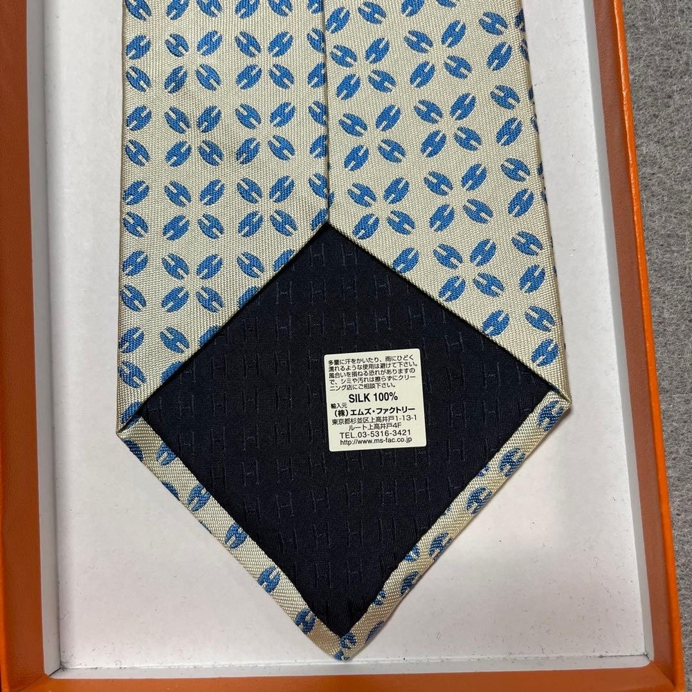HERMES tie blue and white H pattern silk jacquard