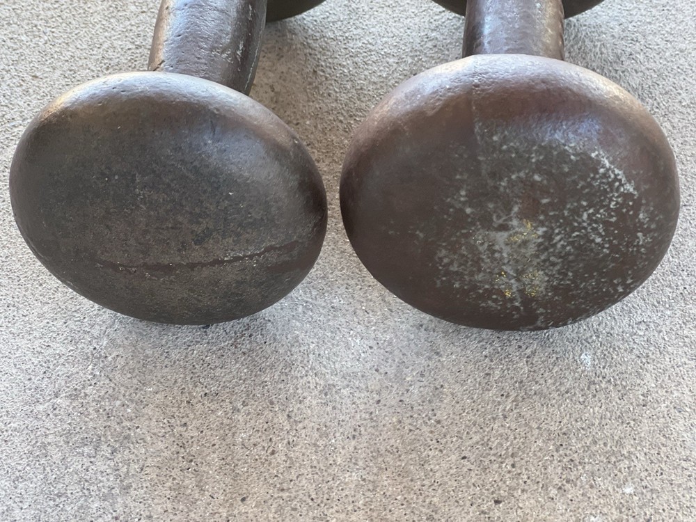 2 BFCO 10 LB. Weights 20lbs. ( One is marked China ) Each a little different