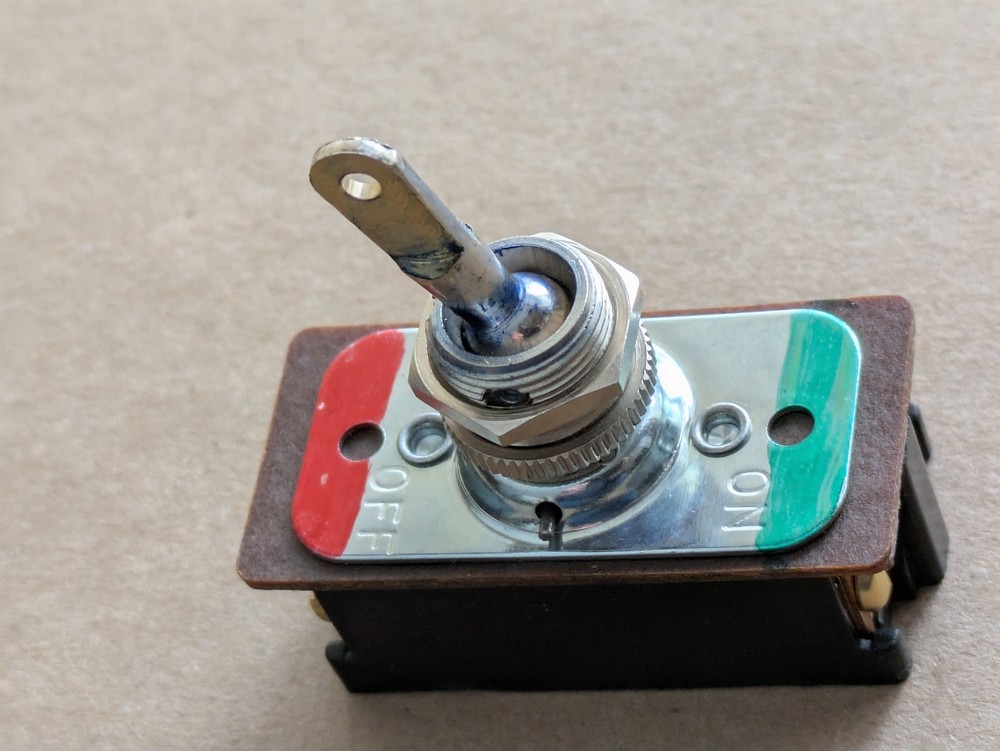 HEAVY DUTY DOUBLE POLE TOGGLE SWITCH - MACHINED WITH A FLAT BLADE HANDLE