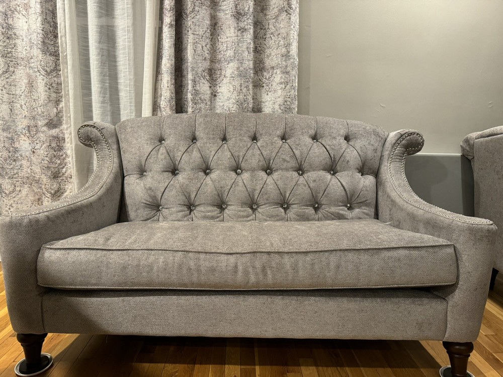 Light grey sofas/ couches.
