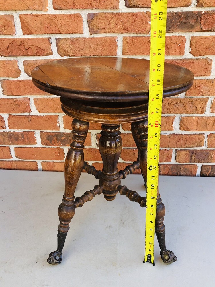 ANTIQUE CLAWFOOTED GLASS BALL ADJUSTABLE PIANO STOOL
