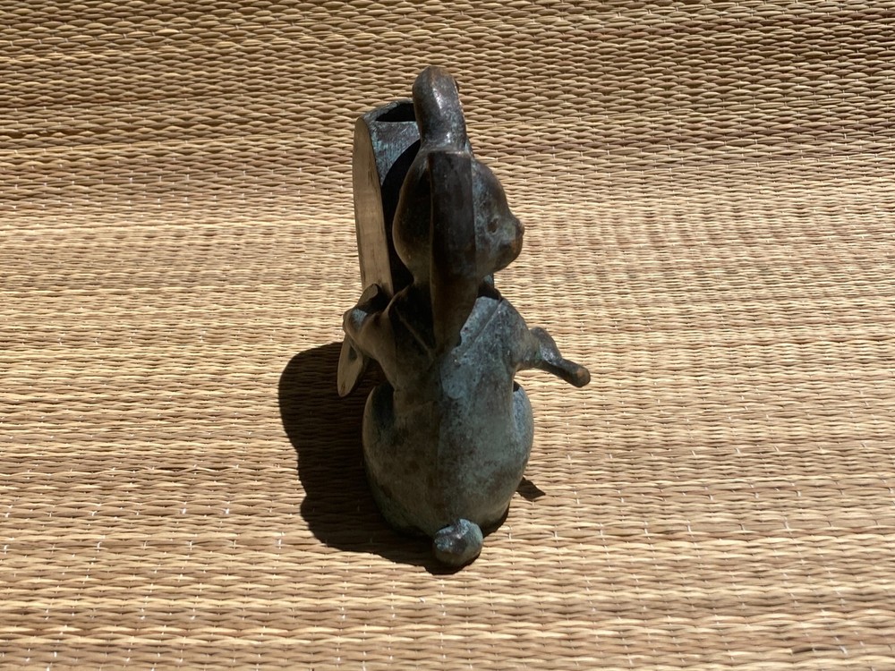 Bunny Vase drumming on a drum