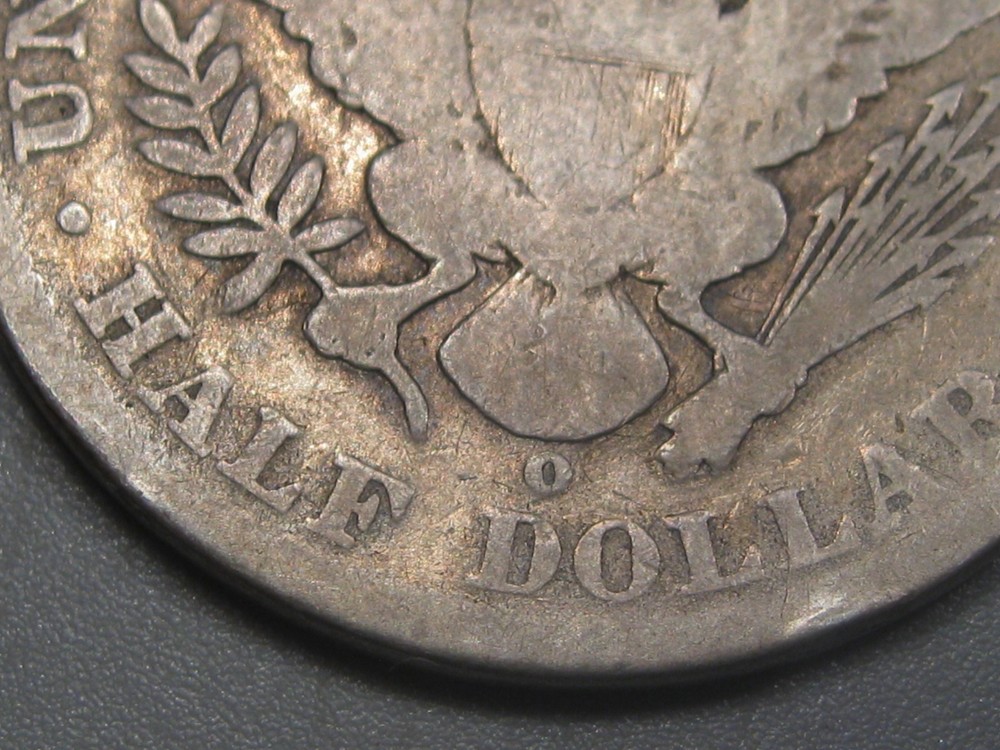 Better-date 1896-o Silver BARBER Half Dollar.