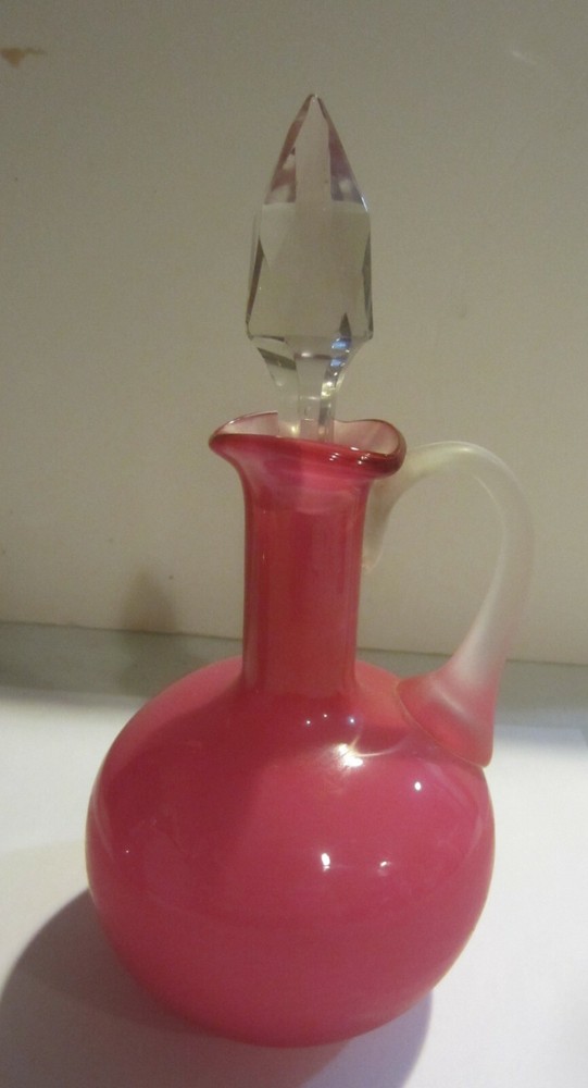 Frosted cranberry color perfume bottle