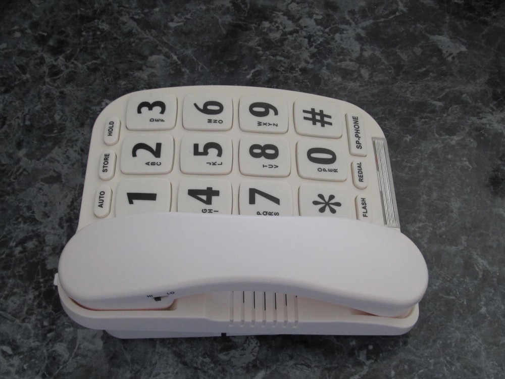 EXTRA LARGE BUTTON TELEPHONE WITH VOICE AMPLIFICATION