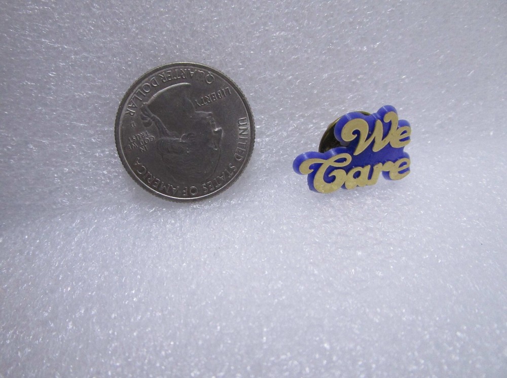We Care Plastic Pin