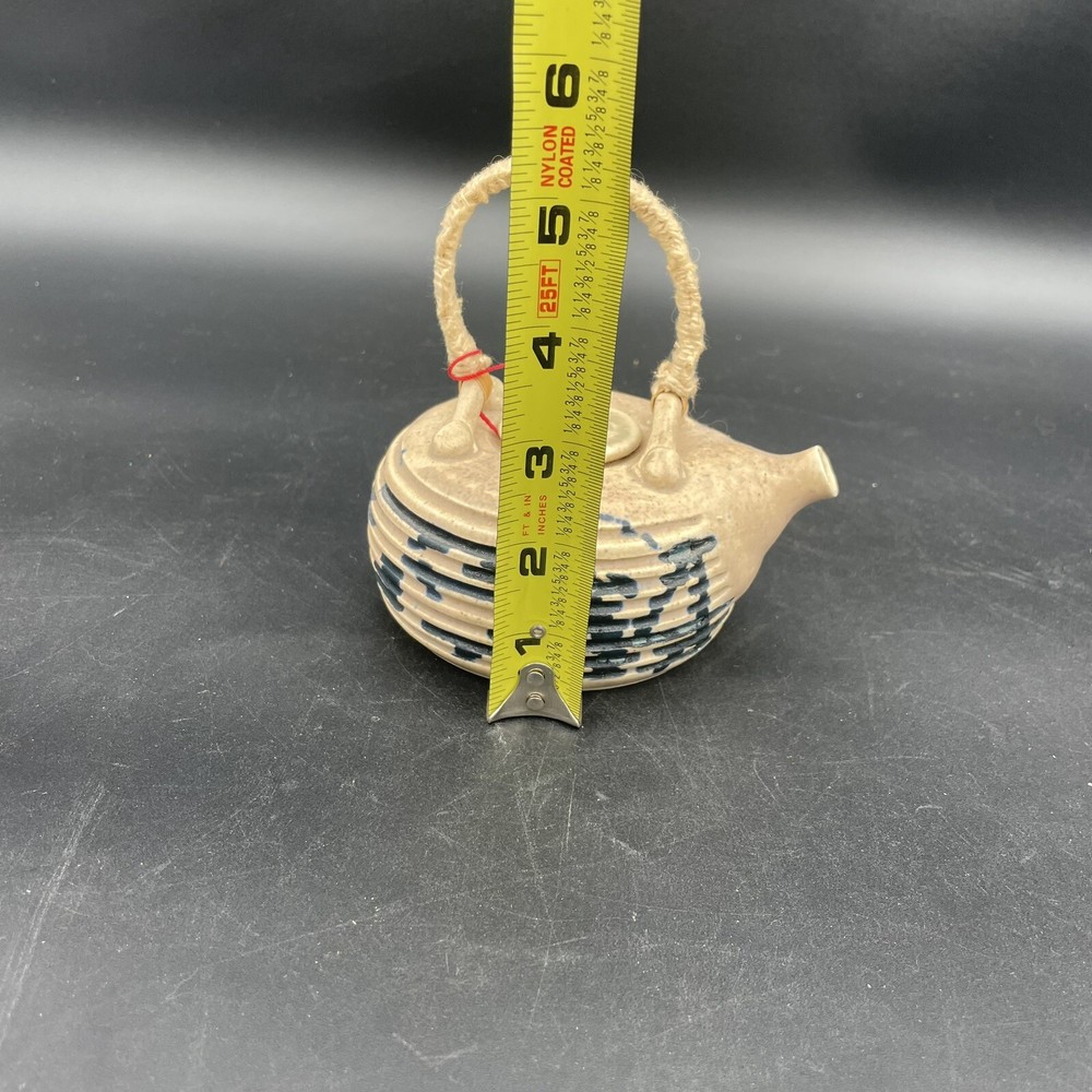 Small Tea Pot Blue & White Pottery w/ Yarn Handle.