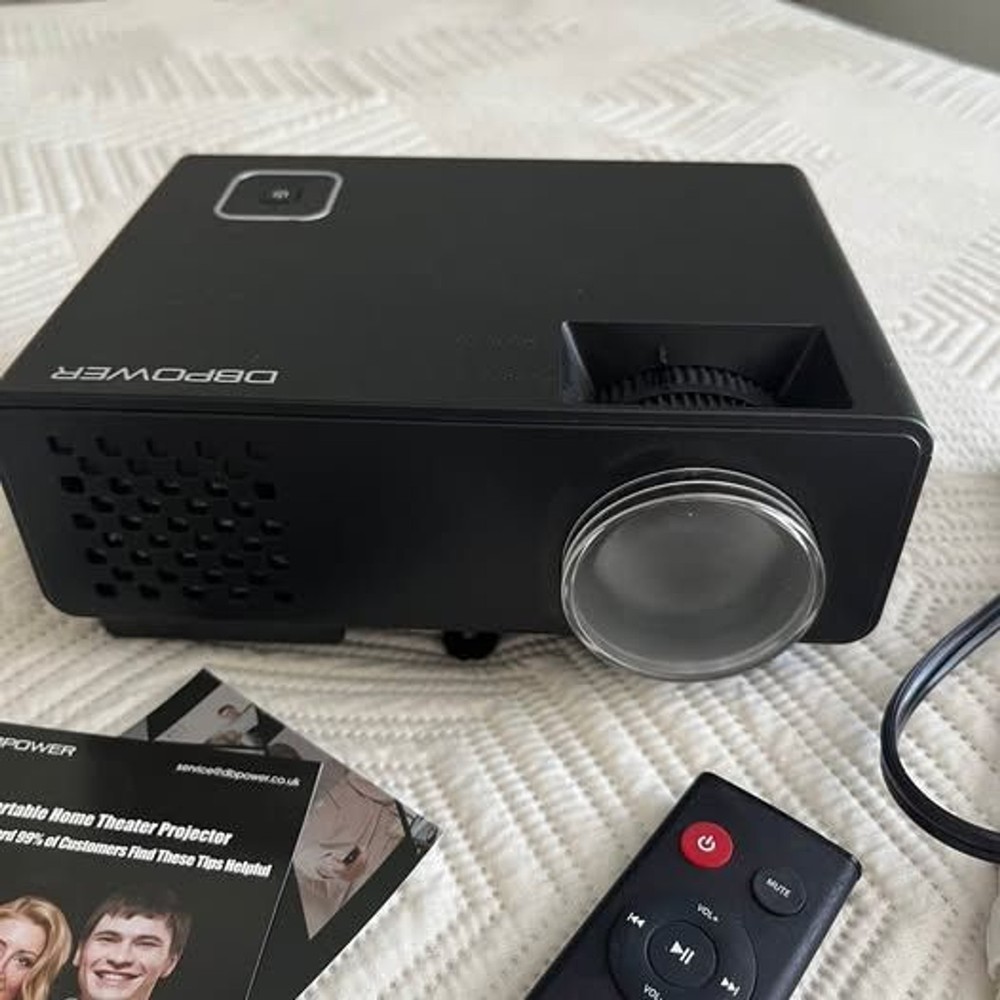 DBPower LED Light Source Mini Projector Includes Remote and Power Cord