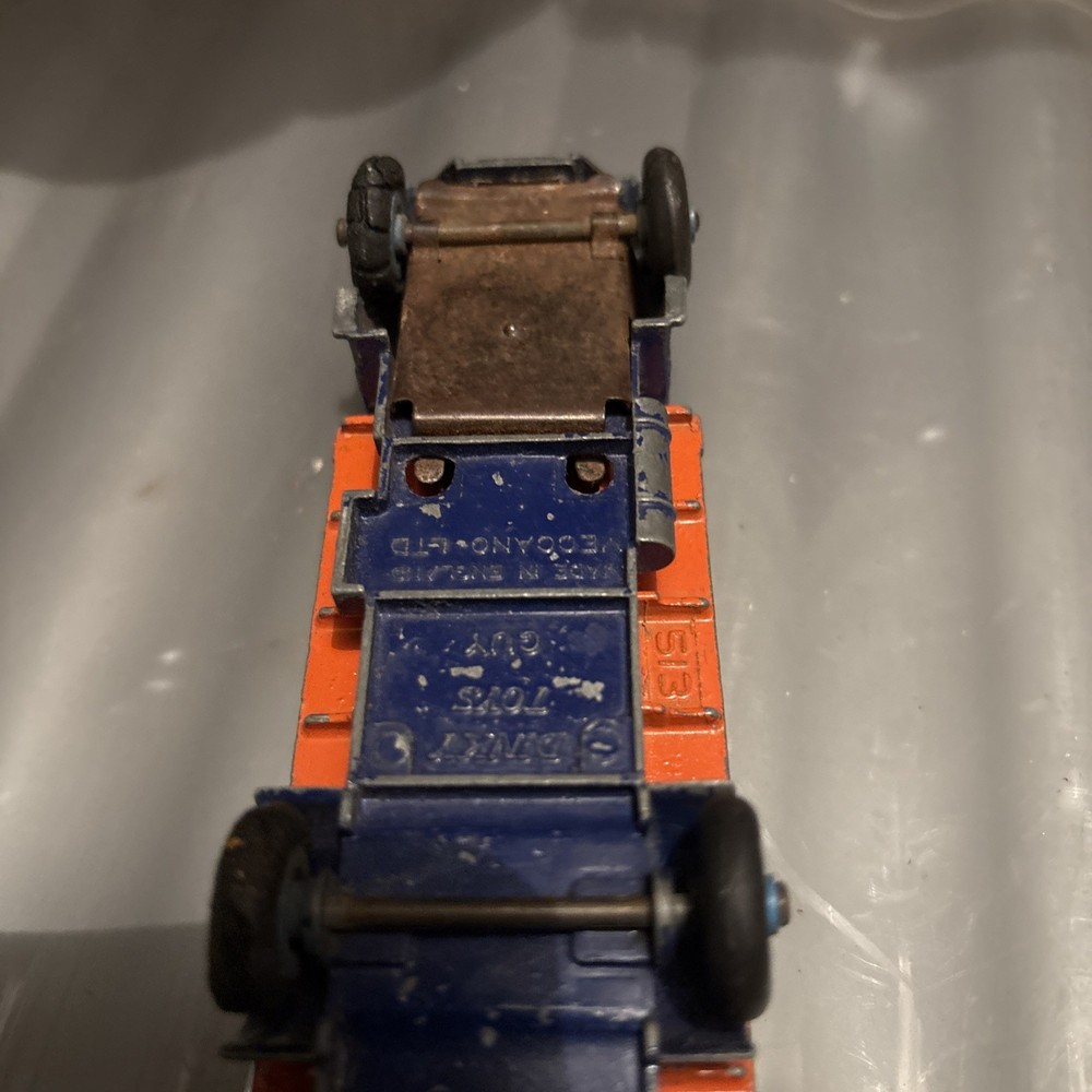 DINKY GUY FLATBED with tailboard 1950s. orange & blue