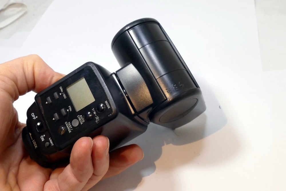 Olympus FL-40 OM FLASH works well, tested