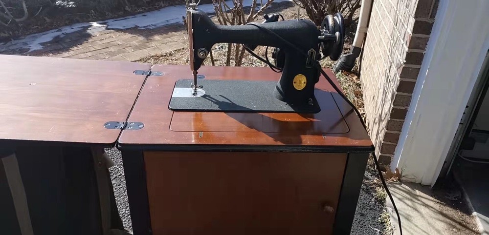 Old Singer Sewing Machine With Its Own Table