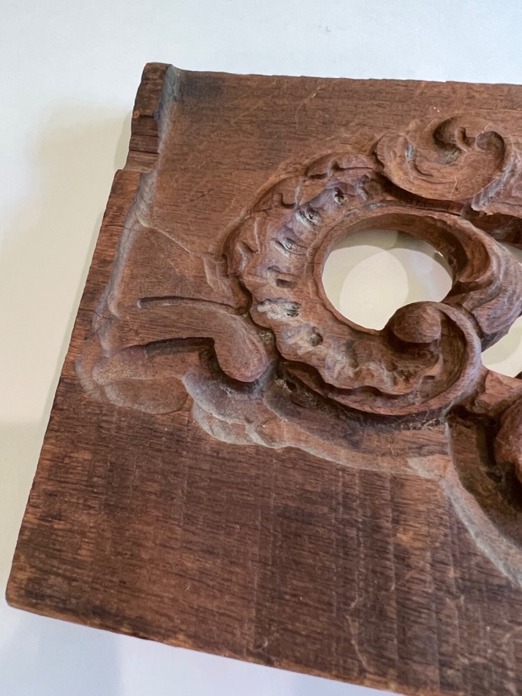 salvaged antique carved board