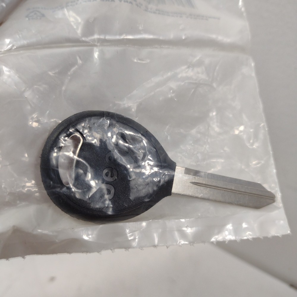 New Genuine Jeep Master Key Blank 5018700AA