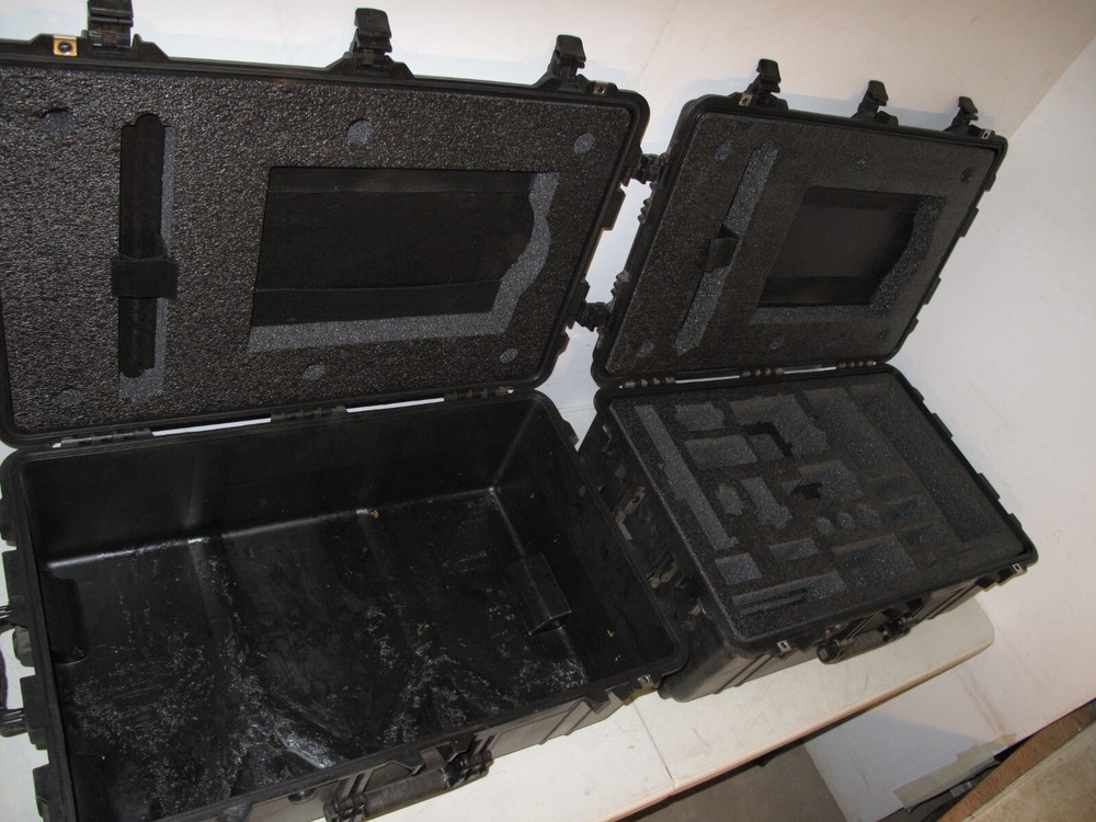 Pelican Protector 1650 Case 32x21x12 OD 29x17x10 ID Wheels Pull Out Handle