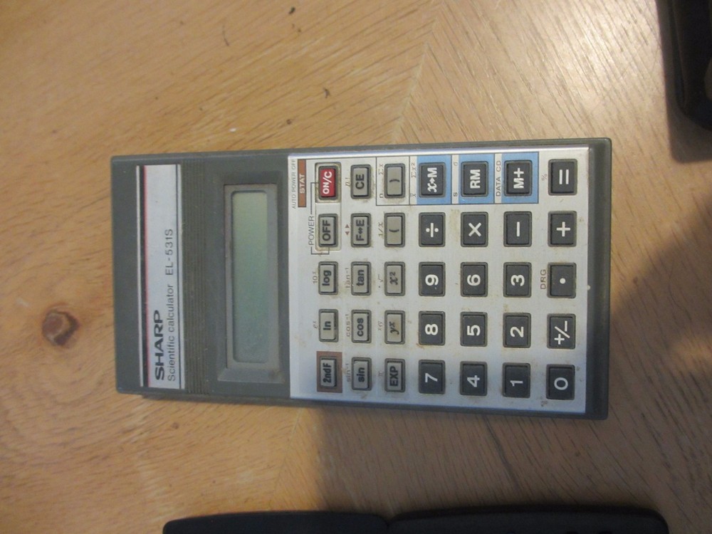 7 Calculators - Scientific - HP - Sharp - Texas Instruments - TI . quantity 7