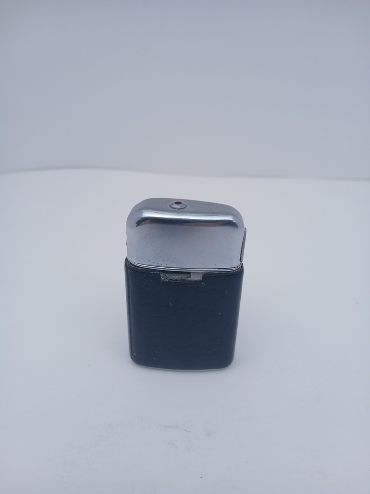 Vintage Ronson Varaflame electronic chrome pocket lighter. Untested.