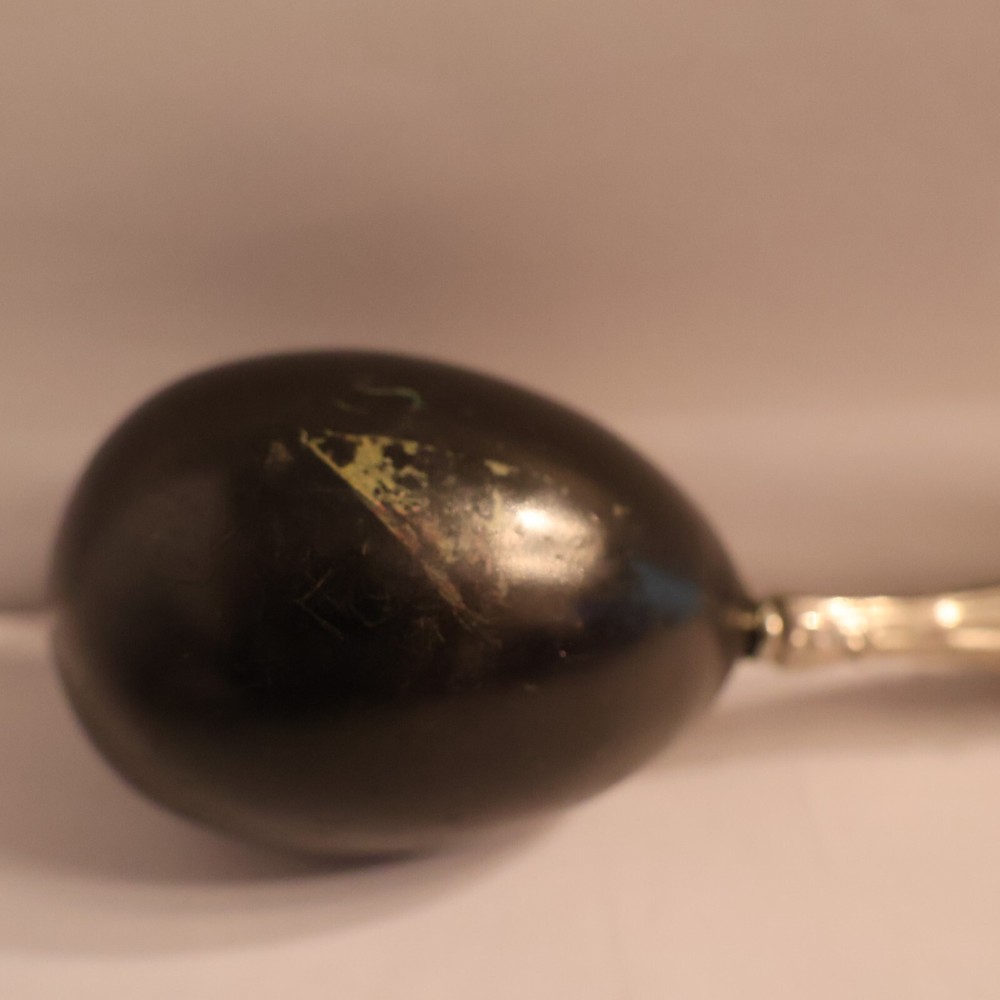 Darner with silver handle