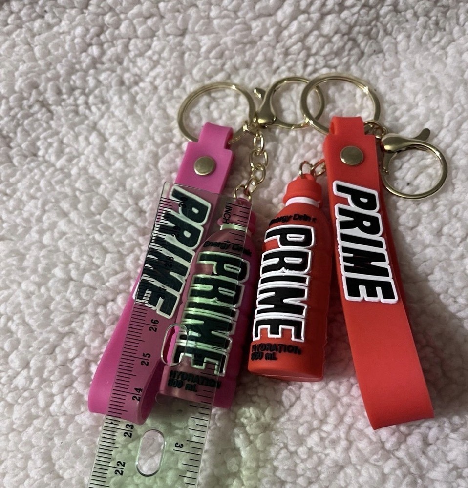 Prime Energy Drink Duo keychains, Red & Pink