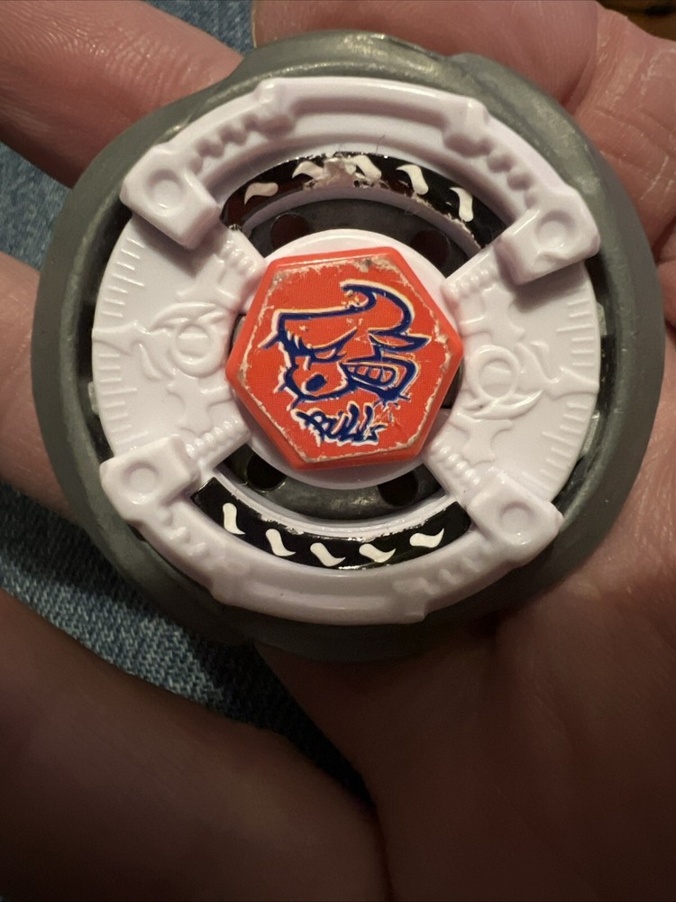 beyblade bull orange center white outer Toy