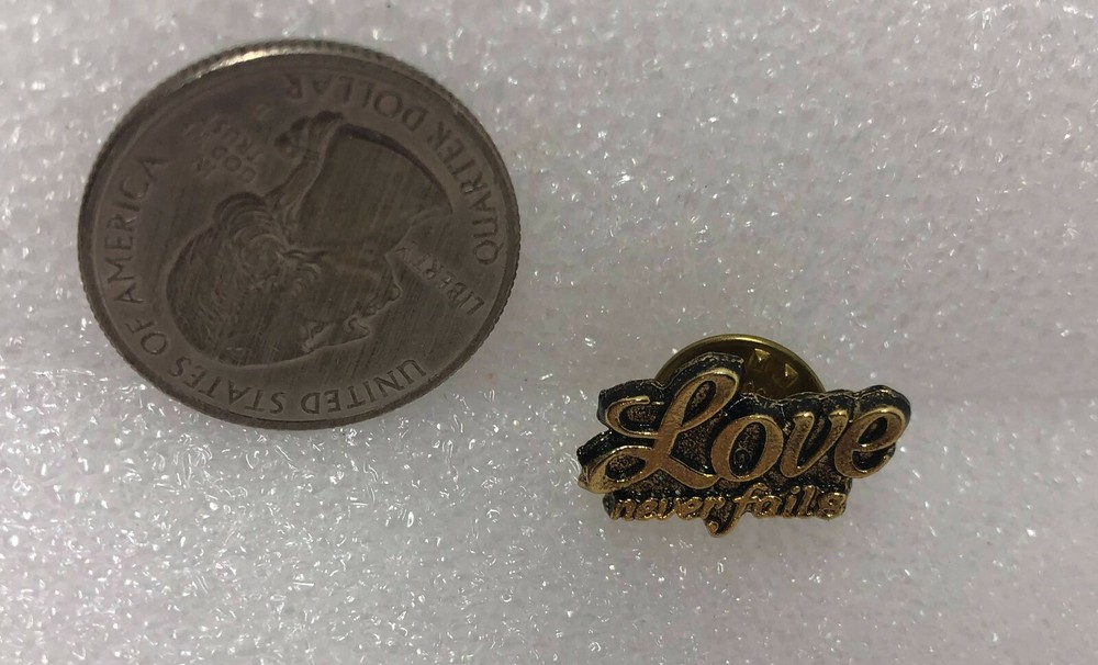 Love Never Fails Pin