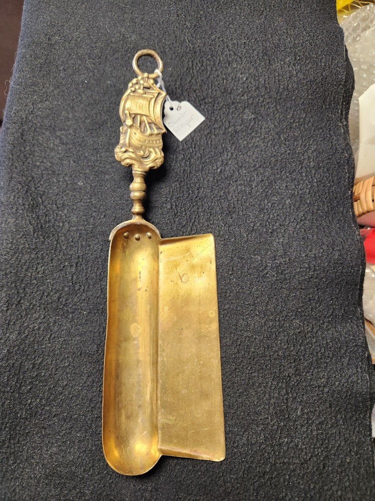 Victorian Brass Crumb Scraper With Ship Motif Handle.