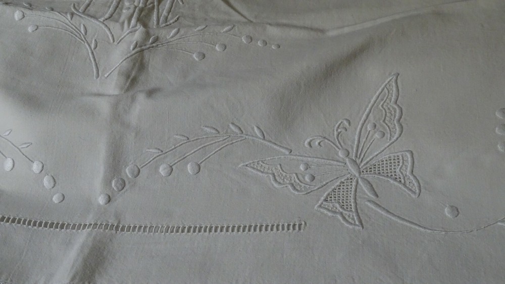 hand embroidered butterfly and mimosa sheet