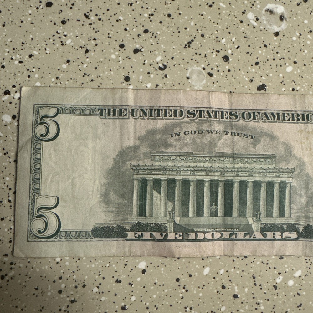 Misaligned, miscut $5 bill RARE