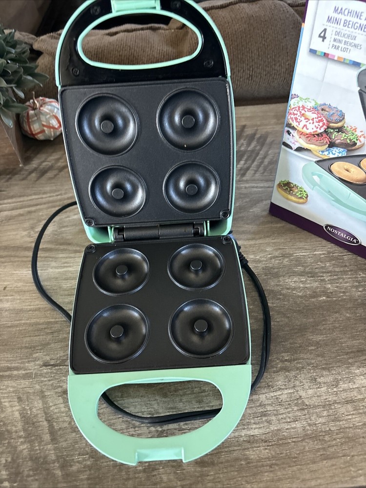 Nostalgia mini donut maker. Makes 4 donuts per batch. (Mint Green)