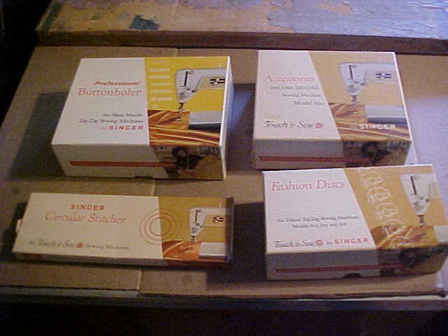 Singer sewing machine 620 4 boxes of attachments