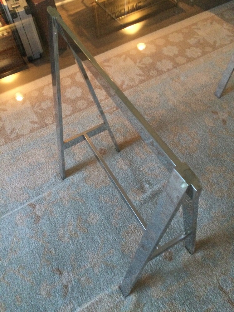 Heavy Glass Top Rectangular Dining Table. Beveled Edge. Stainless Steel Bases.