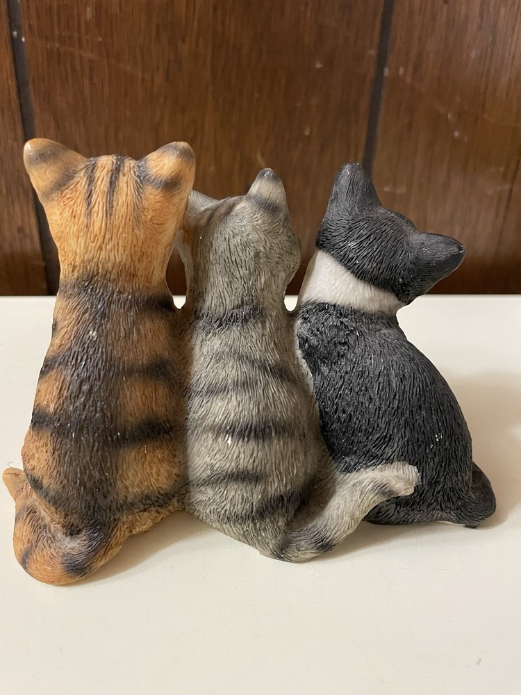 Three Ceramic Cats Attached