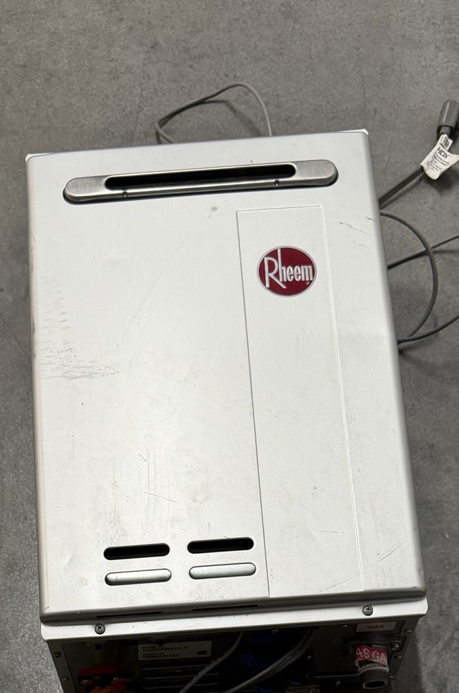 Rheem Silver Tankless Water Heater Unit Instant Hot Water Energy Efficient