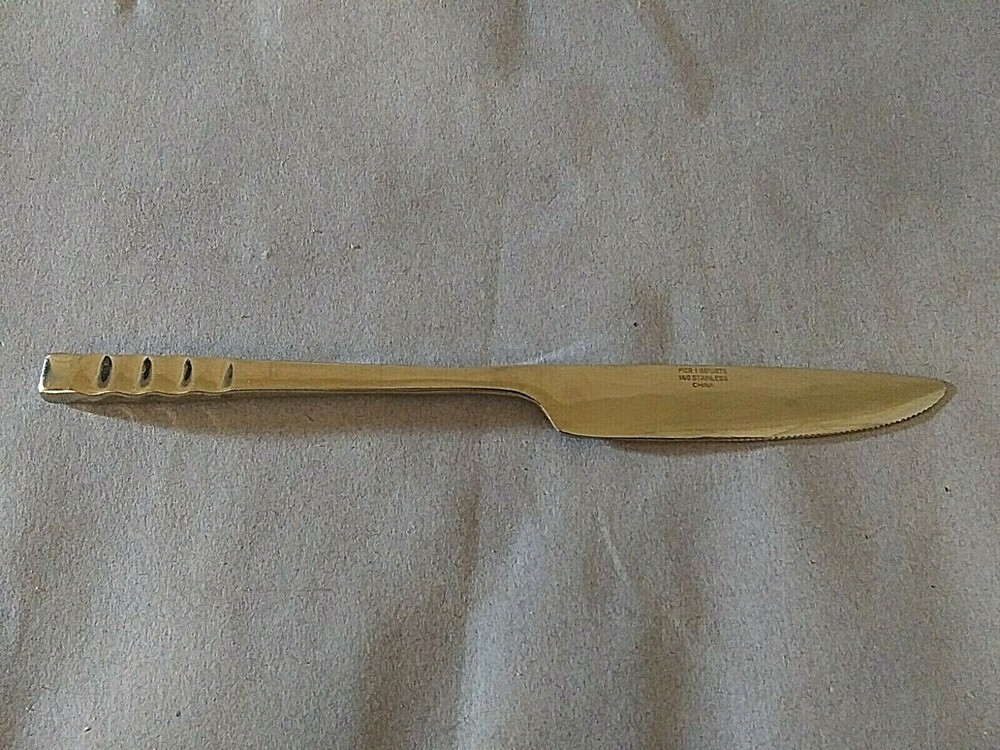 Pier 1 Wavy stainless 9" solid handle dinner knife